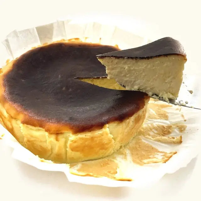 Mao Shan Wang Durian Burnt Cheesecake with a slice lifted out