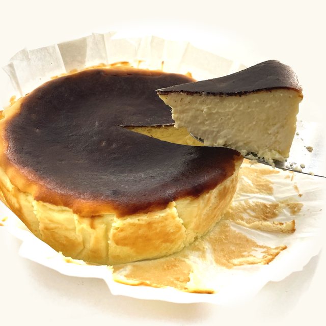 Mao Shan Wang Durian Burnt Cheesecake with a slice lifted out