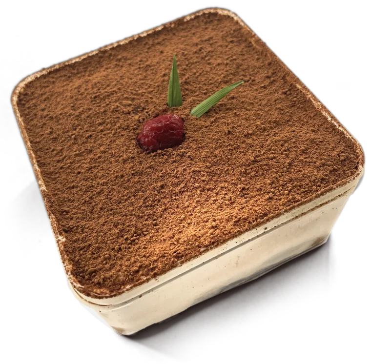 Premium Tiramisu in its clear tub: a cocoa-dusted top with a raspberry and a leaf, and layers of cream and ladyfinger through the side